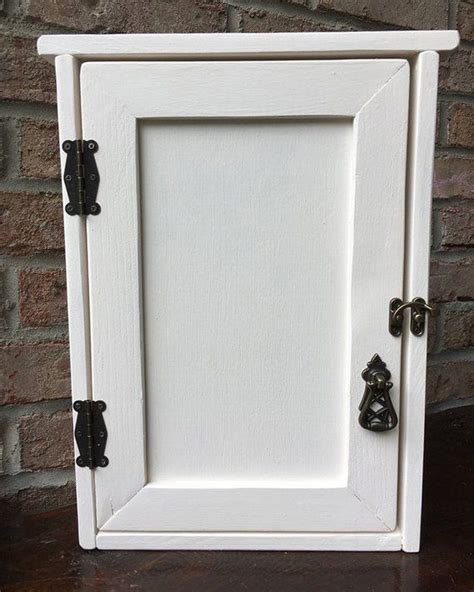 hide unsightly electrical breaker box|how to hide electrical panel.